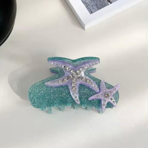 كليب للشعر بشكل نجمة البحر - ٩ سم